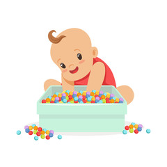 Cute happy baby sitting and playing with box full of multicolored small balls, cartoon character vector Illustration