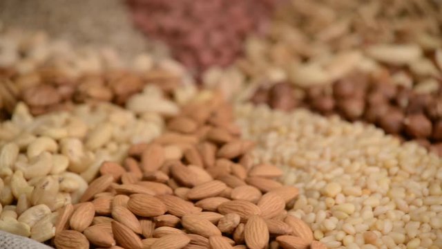 Nuts mix in a canvas bag in table.