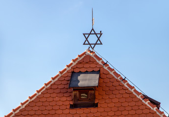 Jewish Star of David atop the roof of the synagogue in Mikulov, Czech republic