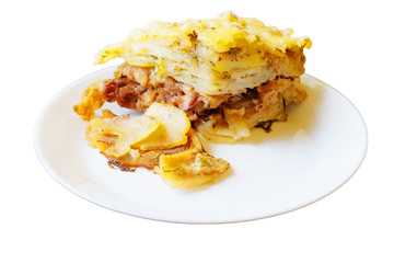potato casserole with Turkey meat in a white plate.isolated on white.