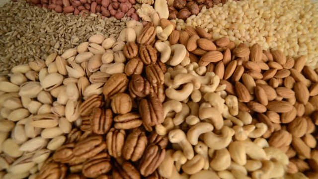 Nuts mix in a canvas bag in table.