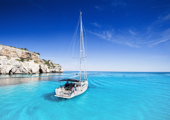 Beautiful bay with sailing boats yacht, Menorca island, Spain. Yachting, travel and active...