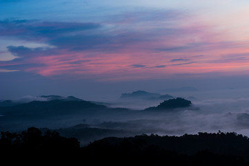 Fototapeta premium Mountain Mist,Beautiful landscape in the mountains at sunrise,Thailand
