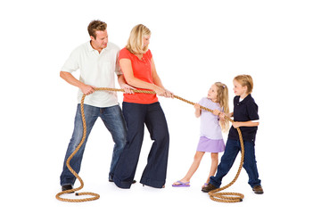 Fototapeta premium Family: Parents Versus Children In Tug Of War