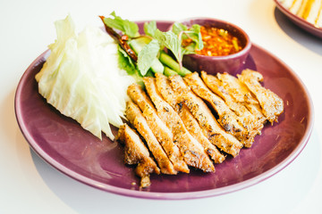 Grilled pork neck meat with spicy sauce