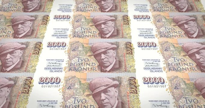 Banknotes of two thousand kroner or crowns of iceland rolling, cash money