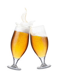 two glasses of beer with splash