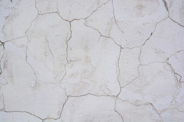 Close up cracked cement plaster texture background