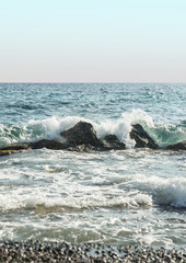 summer sea water with rocks and waves