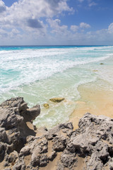 View to the sea on the beaches of the Caribbean ocean. Sunny summer day. Nobody on the beach. Silent destination. Vacation concept image.
