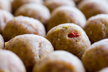 Raw Uncooked Meatballs on a Plate Before Cooking