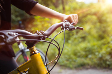 Fototapeta na wymiar Summer sport bicycle in park with sunshine background