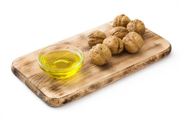 Walnuts oil isolated on white background
