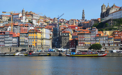 Fototapeta na wymiar Porto, Portugal - 2nd May, 2017: Ribeira (old town), a Unesco World Heritage, seen from Vila Nova De Gaia (the other side of Ponte Dom Luis)