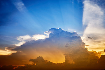 Evening sunset sky with light rays