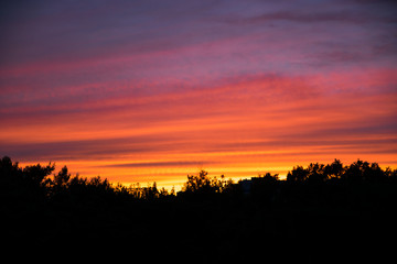 Fototapeta premium Bright sunset over the city of Khabarovsk