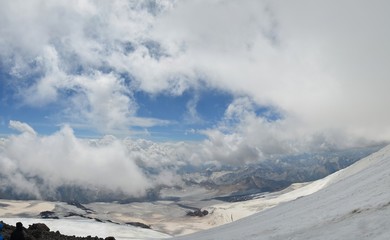 Fototapeta na wymiar Mount Elbrus from the base camp in the fog