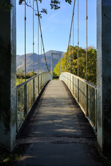 Obraz premium Suspension Footbridge in the Evening Sun, Lake District, Cumbria, England, UK