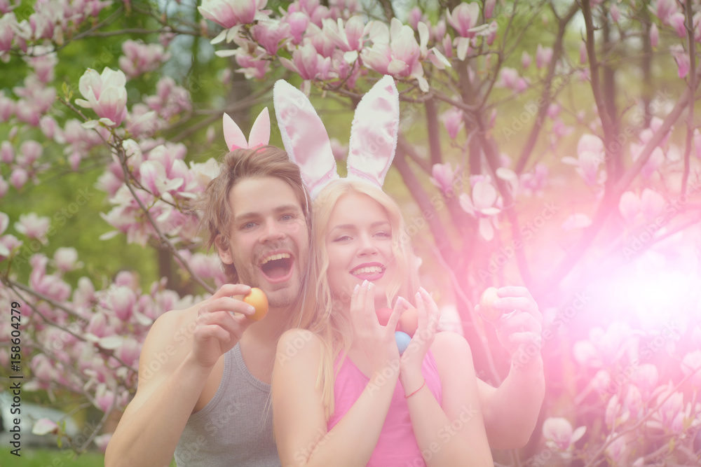 Sticker happiness of man and woman in bunny ears, easter eggs