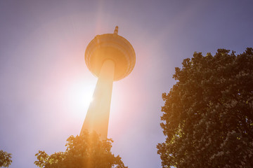 Germany, Baden-Wuerttemberg, Mannheim, near Neckar river: Telecommunication Tower against sun light