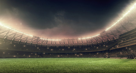 soccer stadium with green grass, illumination lights and dramatic night sky - obrazy, fototapety, plakaty