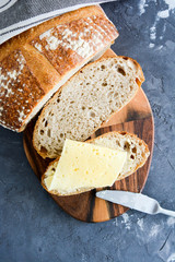 Homemade bread on a black background.