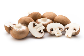 Fresh champignon mushrooms isolated on white.