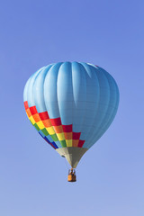Balloon floating above winery at Temecula Balloon Festival in Southern California