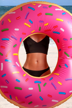 Summer vacation at the beach. Beautiful female waist