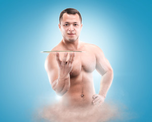 Genie of the lamp with smoke isolated on blue. Sport concept.