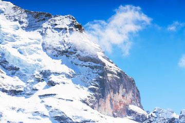Beautiful Alps Mountain with a hidden face at Jungfrau, Switzerland.