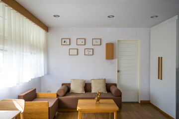 White living room with sofa and furniture