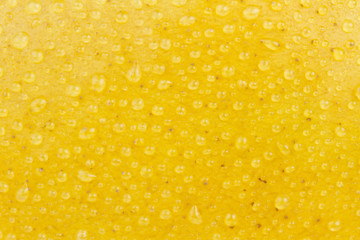 Fresh mango with water dew, texture background