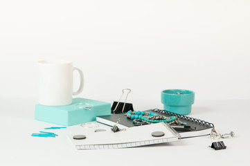 Feminine styled office desktop with teal accents