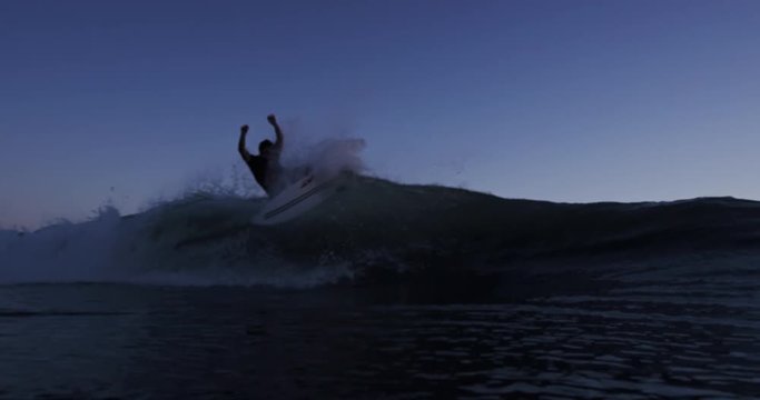 Sunset Surfer Silhouette Riding Bllue Ocean Wave