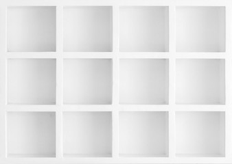 White color shelves on wall