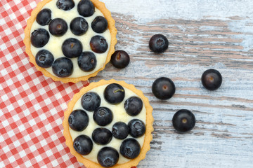 blueberry fruit cake on wood