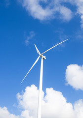 Wind turbine electricity on blue sky background
