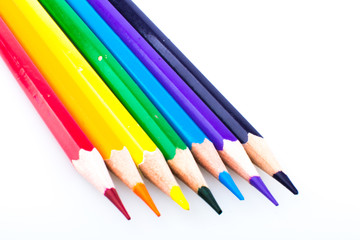Colour pencils isolated on white background close up