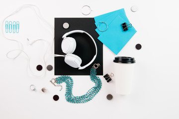 Feminine Office items on a white desktop flatlay