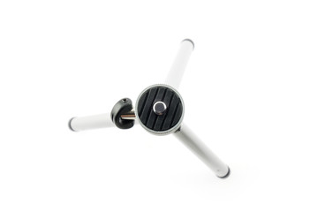Mini tripod / Mini tripod for camera on white background. Top view.