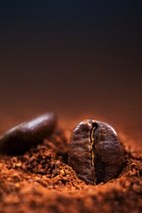 Arabica Coffee beans macro on a brown background close up, macro