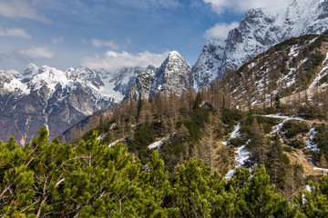 Fototapeta na wymiar Julian Alps and small mountain shelter on the pass Vrsic, Slovenia