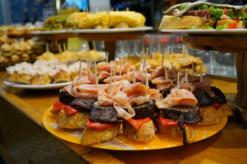 Spanish fingerfood and tapas set on bar counter