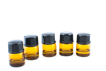 1ml essential oil bottles isolated on white background close up