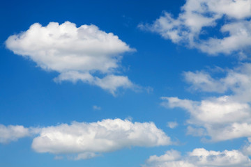 Fototapeta na wymiar Blue sky with clouds on a sunny day.
