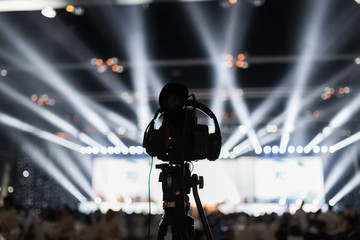 Blur of camcorder while filming at event concert