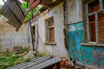 Fototapeta na wymiar wrecked room in an old abandoned house
