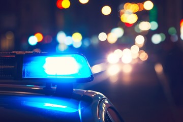 Fototapeta premium Samochód policyjny na ulicy