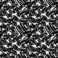 Seamless repeating textile ink brush strokes pattern in doodle grunge texture style.